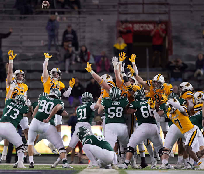 Dec 30, 2022; Tucson, AZ, USA; Ohio Bobcats place kicker Nathanial Vakos (90) kicks a field goal against the Wyoming Cowboys during the second half in the 2022 Arizona Bowl at Arizona Stadium. Mandatory Credit: Joe Camporeale-USA TODAY Sports